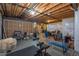 Unfinished basement with exposed ceiling and wooden framework, offering potential for customization and expansion at 23579 E Swallow Cir, Aurora, CO 80016