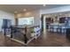 Open-concept living space showcasing the living room, dining area, and kitchen at 23579 E Swallow Cir, Aurora, CO 80016