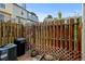 Enclosed private patio with wooden fence and view of the community at 9188 W Ontario Dr, Littleton, CO 80128