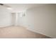 Bright bedroom with a carpet flooring and natural light from the window at 4945 Perry St, Denver, CO 80212