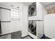 Laundry room featuring a stacked washer and dryer unit at 4945 Perry St, Denver, CO 80212
