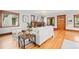 Inviting living room boasts hardwood floors, a decorative fireplace, and comfortable seating for a cozy atmosphere at 4945 Perry St, Denver, CO 80212