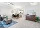 Open living and dining area with a modern color palette and decor at 12558 E Tennessee Cir, Aurora, CO 80012