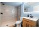 Updated bathroom with a glass shower, and modern vanity at 610 E Baseline Rd, Lafayette, CO 80026