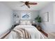 Cozy bedroom with a comfortable bed, neutral tones, and natural light streaming in through the window at 610 E Baseline Rd, Lafayette, CO 80026