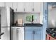 Well-appointed kitchen with modern appliances, granite countertops, and ample storage space at 610 E Baseline Rd, Lafayette, CO 80026