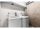Laundry room features a new LG washer and dryer at 610 E Baseline Rd, Lafayette, CO 80026