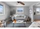 Comfortable living room with a neutral color palette, modern décor, and natural light at 610 E Baseline Rd, Lafayette, CO 80026