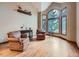 Bright living room featuring vaulted ceilings and large windows with beautiful outdoor views at 19748 E Pinewood Dr, Aurora, CO 80016