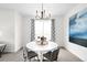 Modern dining area featuring a round table, stylish lighting, and contemporary decor at 17200 Waterhouse Cir # D, Parker, CO 80134