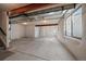 Unfinished basement features ample natural light, high ceilings, and open layout to personalize the space at 6805 Canosa St, Denver, CO 80221