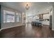 Spacious living room and kitchen area with hardwood floors and lots of natural light at 6805 Canosa St, Denver, CO 80221