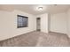Basement bedroom with carpet, window, and closet at 1945 Basil St, Strasburg, CO 80136