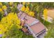 Aerial view of property highlighting its architectural design and surrounding wooded landscape at 2356 Hiwan Dr # 40, Evergreen, CO 80439