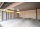 Spacious carport with built in storage, offers ample sheltered parking and organization at 2356 Hiwan Dr # 40, Evergreen, CO 80439