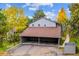 Covered carport providing convenient parking with an inviting, sheltered entrance to the property at 2356 Hiwan Dr # 40, Evergreen, CO 80439