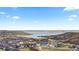 New neighborhood aerial view showcases panoramic water and mountain views, combining nature and community living at 2020 Sagerock Dr, Castle Pines, CO 80108