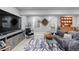 Finished basement featuring a TV and a comfortable seating area for relaxation, and unique decor at 2020 Sagerock Dr, Castle Pines, CO 80108