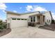 Charming single-Gathering home with a two-car garage, covered porch, and meticulous landscaping at 2020 Sagerock Dr, Castle Pines, CO 80108