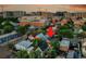 Aerial view of the neighborhood showcasing mature trees and building locations at 671 Elati St, Denver, CO 80204
