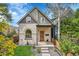 Charming home with a manicured front yard and inviting front porch at 671 Elati St, Denver, CO 80204