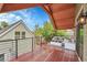 Inviting wood deck with cozy seating and neighborhood views at 671 Elati St, Denver, CO 80204