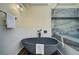 Well-lit bathroom showcasing modern fixtures, soaking tub, and a beautifully tiled glass enclosed shower at 9163 N Palomino Dr, Castle Rock, CO 80108