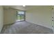 Bright bedroom with a slider door and a view of the outside at 9163 N Palomino Dr, Castle Rock, CO 80108
