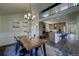 Dining room and kitchen open concept floor plan with overhead loft space at 9163 N Palomino Dr, Castle Rock, CO 80108