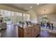 Open concept living space with kitchen, dining and living area, backyard view at 9163 N Palomino Dr, Castle Rock, CO 80108