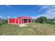 Charming red outbuilding for storage or hobby space at 9163 N Palomino Dr, Castle Rock, CO 80108