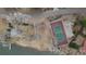 Aerial view showcasing the community tennis court and lake access, perfect for recreation and relaxation at 2765 S Winona Ct, Denver, CO 80236