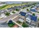 Aerial view of a home's backyard with privacy fence, landscaping, and solar panels at 4404 Walden St, Denver, CO 80249