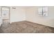 Another bedroom view showing natural light and carpet at 4404 Walden St, Denver, CO 80249