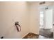Spacious laundry room with hookups and nearby bathroom, providing practicality and ease at 4404 Walden St, Denver, CO 80249