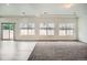 Bright and airy living room, features a slider to back yard, and lots of natural light at 4404 Walden St, Denver, CO 80249