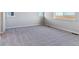 Bright bedroom with neutral carpeting and large windows at 3484 N Irvington St, Aurora, CO 80019