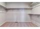 Spacious walk-in closet with ample shelving and hanging space at 3484 N Irvington St, Aurora, CO 80019