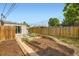 Private backyard featuring a wooden fence, patio, and low-maintenance landscaping at 1021 Stuart St, Denver, CO 80204