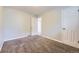 Bright bedroom featuring neutral walls, carpet, white trim, and two closets offers comfort at 1021 Stuart St, Denver, CO 80204