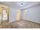 Bright bedroom with neutral carpet, ample natural light, and access to a bathroom and walk-in closet at 1021 Stuart St, Denver, CO 80204