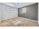 Inviting bedroom featuring soft carpet, neutral walls, and bright windows for a cozy atmosphere at 1021 Stuart St, Denver, CO 80204