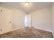 Comfortable bedroom with carpeted floor and access to two closets at 1021 Stuart St, Denver, CO 80204