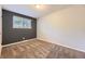 Neutral bedroom with carpet, natural light, and two-tone paint is cozy and inviting at 1021 Stuart St, Denver, CO 80204