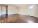 Bright living room with hardwood floors and white trim offers a clean and inviting space at 1021 Stuart St, Denver, CO 80204