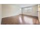 Bright living room with hardwood floors and white trim offers a clean and inviting space at 1021 Stuart St, Denver, CO 80204