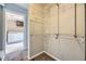 Spacious walk-in closet with ample shelving and convenient access to the laundry room for easy organization at 1021 Stuart St, Denver, CO 80204