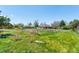 Expansive backyard featuring a garden and a partially obscured view of the residence at 6212 S Pennsylvania St, Centennial, CO 80121