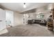 Spacious basement with cozy living area and convenient laundry room at 9832 High St, Thornton, CO 80229