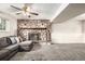 Finished basement featuring a charming stone fireplace at 9832 High St, Thornton, CO 80229